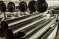 Stack of steel or metal pipes as industrial background Royalty Free Stock Photo