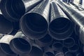 Stack of steel or metal pipes or round tubes as industrial background with perspective Royalty Free Stock Photo