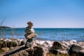 Stack of stone pebbles on beach for mental health zen concept Royalty Free Stock Photo