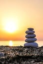 Stack of stones against golden sunset Royalty Free Stock Photo