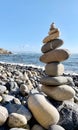 stack of stones on beach.Meditation with the stone tower on the sea shore Royalty Free Stock Photo