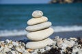 Stack of stones on the beach in summer.