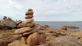 stack stones, apachetas, in the beach symbolizing interne balance