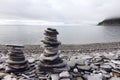 Stack of stones on fjord background Royalty Free Stock Photo
