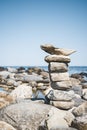Stack of stones on a rocky beach Royalty Free Stock Photo