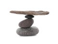 Stack of stones with tree branch on white background. Harmony and balance concept Royalty Free Stock Photo