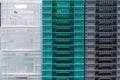 Stack Storage of new colourful white, grey and blue plastic container boxes Royalty Free Stock Photo