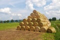 Stack of straw bales - round straw bales stacked in a pyramid Royalty Free Stock Photo