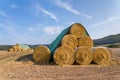 Stack of straw rolls in german field Royalty Free Stock Photo