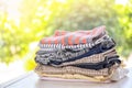 Stack of stylish child clothes on table Royalty Free Stock Photo