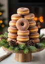 A stack of sugar-coated donuts displayed on a rustic wooden stand. Royalty Free Stock Photo