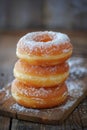 Stack of Sugared Golden Donuts on Wooden Surface