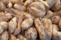 Stack of sweet potatoes on a market stall Royalty Free Stock Photo