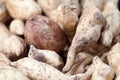 Stack of sweet potatoes on a market stall Royalty Free Stock Photo