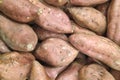 Stack of sweet potatoes on a market stall Royalty Free Stock Photo