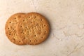 Stack of sweetmeal digestive biscuits closeup of a pile of biscuits on a texture background