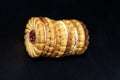 Stack of sweetmeal digestive biscuits isolated on black background