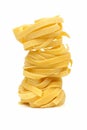 Stack of tagliatelle pasta nests Royalty Free Stock Photo