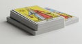 A stack of tarot cards is displayed, featuring the \