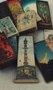 A stack of tarot cards featuring the Tower card, set on a wooden table Royalty Free Stock Photo