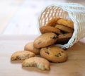 Stack of tasty choc chip cookies on wooden table Royalty Free Stock Photo