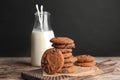 Stack of tasty chocolate chip cookies and bottle of milk Royalty Free Stock Photo