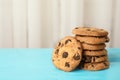 Stack of tasty chocolate chip cookies on wooden table. Royalty Free Stock Photo