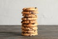 Stack of tasty chocolate chip cookies on wooden table Royalty Free Stock Photo