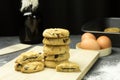 Stack of tasty chocolate cookies on gray table Royalty Free Stock Photo