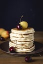Stack of Tasty Homemade Pancakes with Fresh Fruits Vertical Dark Photo Tasty American Pancake Toned