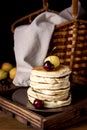 Stack of Tasty Homemade Pancakes with Fresh Fruits Vertical Dark Photo Tasty American Pancake