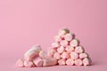 Stack of tasty marshmallows on pink background Royalty Free Stock Photo