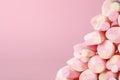 Stack of tasty marshmallows on pink background, closeup. Space for text Royalty Free Stock Photo