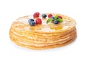 Stack of tasty thin pancakes with maple syrup and fresh berries Royalty Free Stock Photo