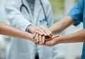 Stack, team building or hands of doctors with collaboration for healthcare goals in meeting or community. Closeup