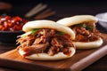 stack of tempting pulled pork buns