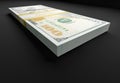Thick Stack of Ten Thousand Dollars of One Hundred Dollar Bills on Black Reflective Surface Royalty Free Stock Photo