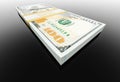 A Stack of Ten Thousand Dollars of One Hundred Dollar Bills on Black Reflective Surface Royalty Free Stock Photo