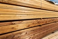 Stack of terrace boards for sale at lumber yard Royalty Free Stock Photo