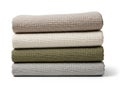 Stack of textured fabrics isolated on white background Royalty Free Stock Photo