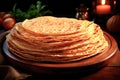 Stack of thin pancakes on the table. Celebration of Maslenitsa