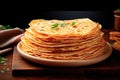 Stack of thin pancakes on the table. Celebration of Maslenitsa