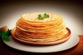 Stack of thin pancakes on the table. Celebration of Maslenitsa