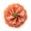 Stack of thinly sliced pink ham arranged in a circular pattern with fresh parsley garnish Royalty Free Stock Photo