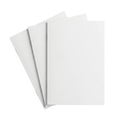 A stack of three blank white sheets of paper with a slight shadow effect Royalty Free Stock Photo