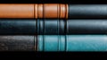 A stack of three books with leather spines and varying colors. Royalty Free Stock Photo