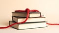 Bound Knowledge A Stack of Books Tied in Red Royalty Free Stock Photo