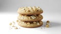 A stack of three freshly baked macadamia nut and white chocolate chip cookies with a sprinkle of nuts and chocolate chips around Royalty Free Stock Photo