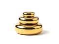 Stack of three golden circular objects Royalty Free Stock Photo
