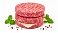 Stack of Three Gridded Raw Beef Burger Patties with Basil and Peppercorns patty meat Royalty Free Stock Photo